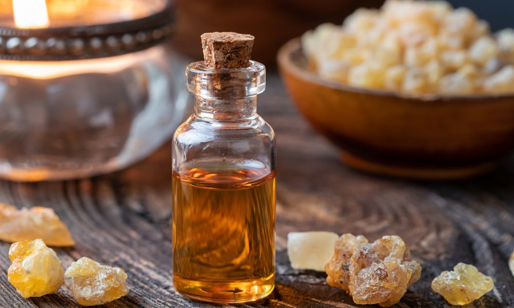 Frankincense essential oil bottle with natural skincare benefits for reducing wrinkles, promoting radiance, and soothing irritation.